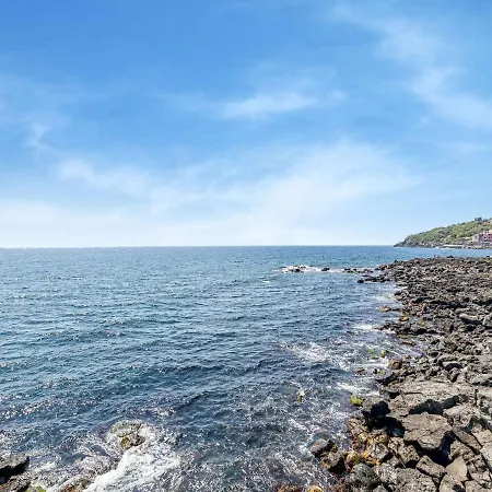 Ancient Overlooking The Sea With Garden